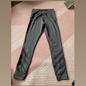 Grey Lululemon leggings with back zipper